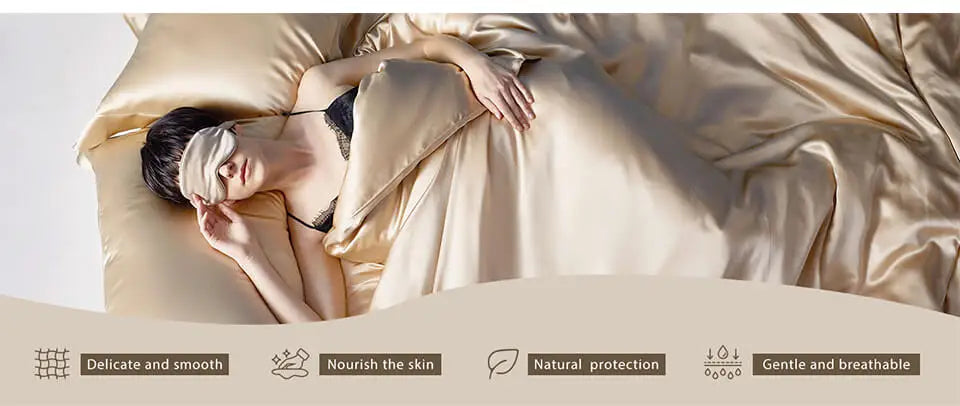 Person sleeping under beige mulberry silk bedding with a neutral background